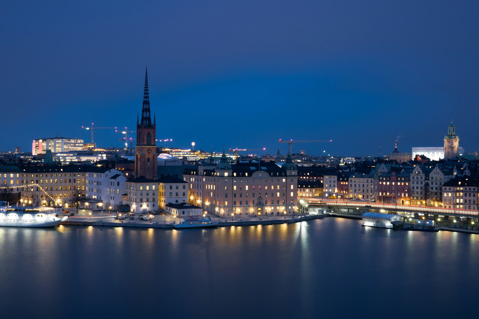 a view of a city at night from across the water